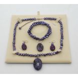 An Organics purple freshwater pearl set