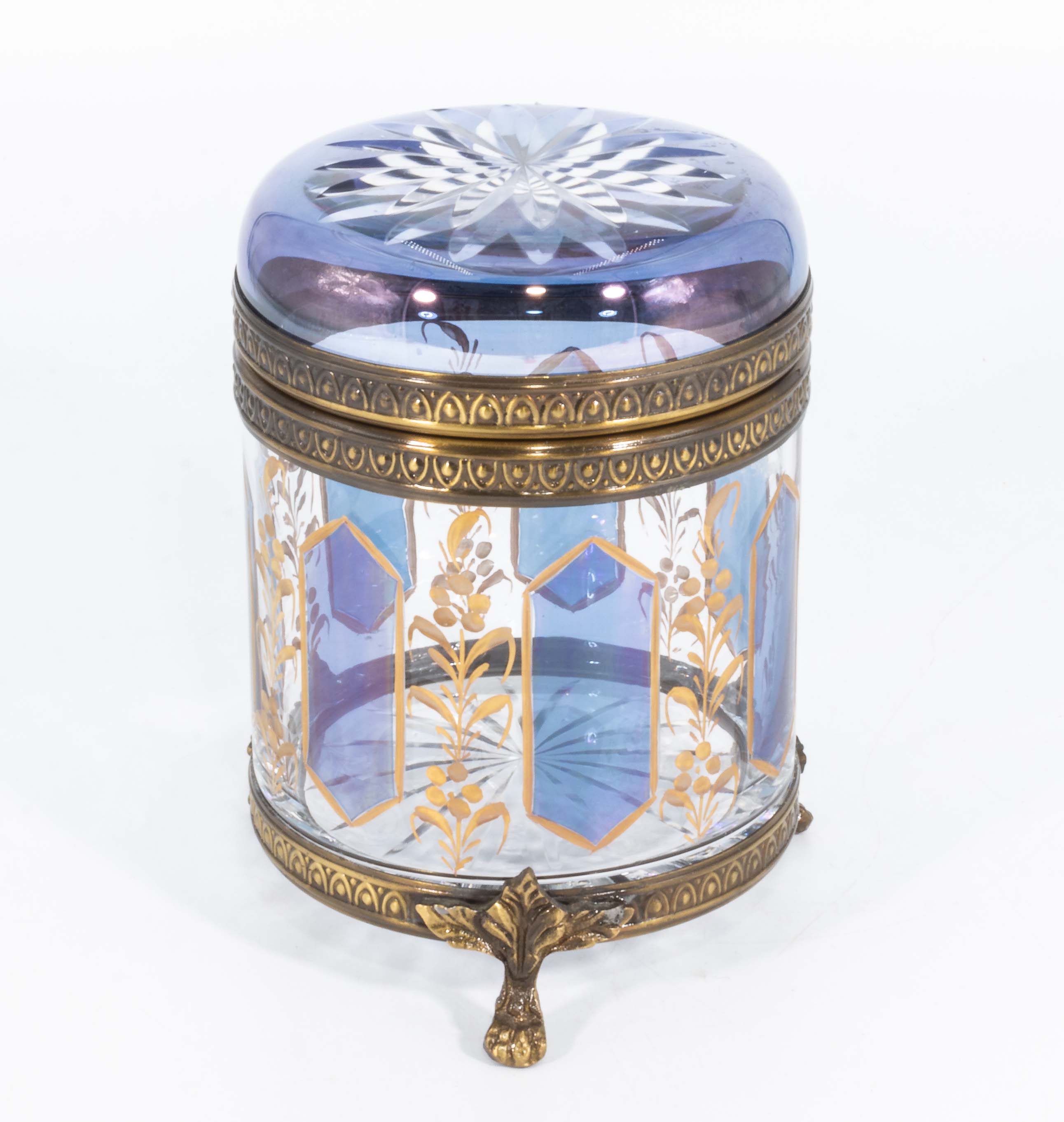 A decorative glass lidded jar