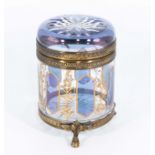 A decorative glass lidded jar