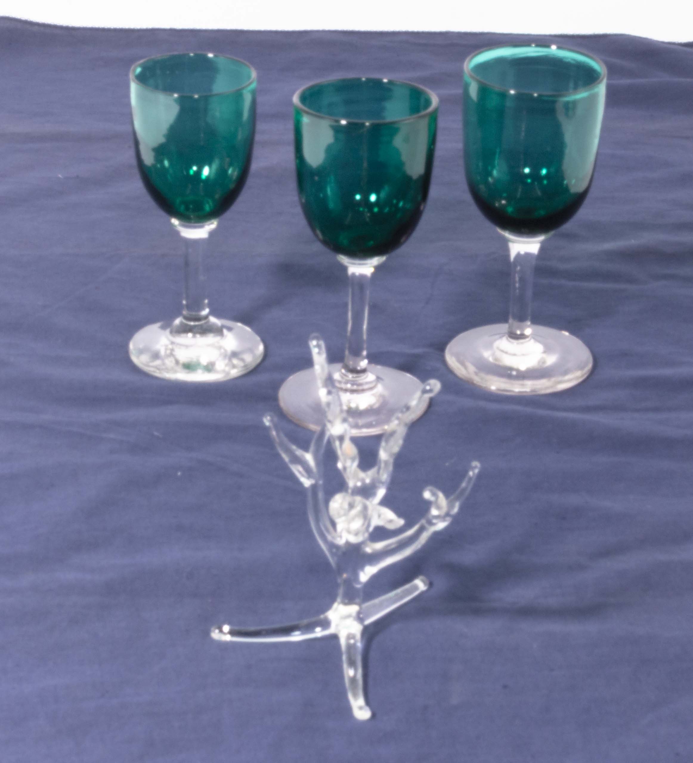 Three wine glasses and a ring stand