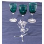 Three wine glasses and a ring stand