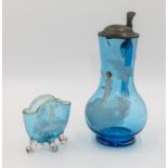 A large Victorian Mary Gregory blue glass carafe together with a posy bowl