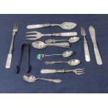 A collection of cutlery some silver