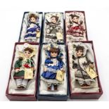 Six Victorian style dressed dolls