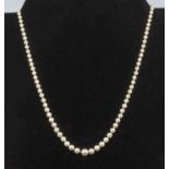 A string of Mikimoto pearls, largest pearl 5mm to smallest at 2mm, length 50cm together with