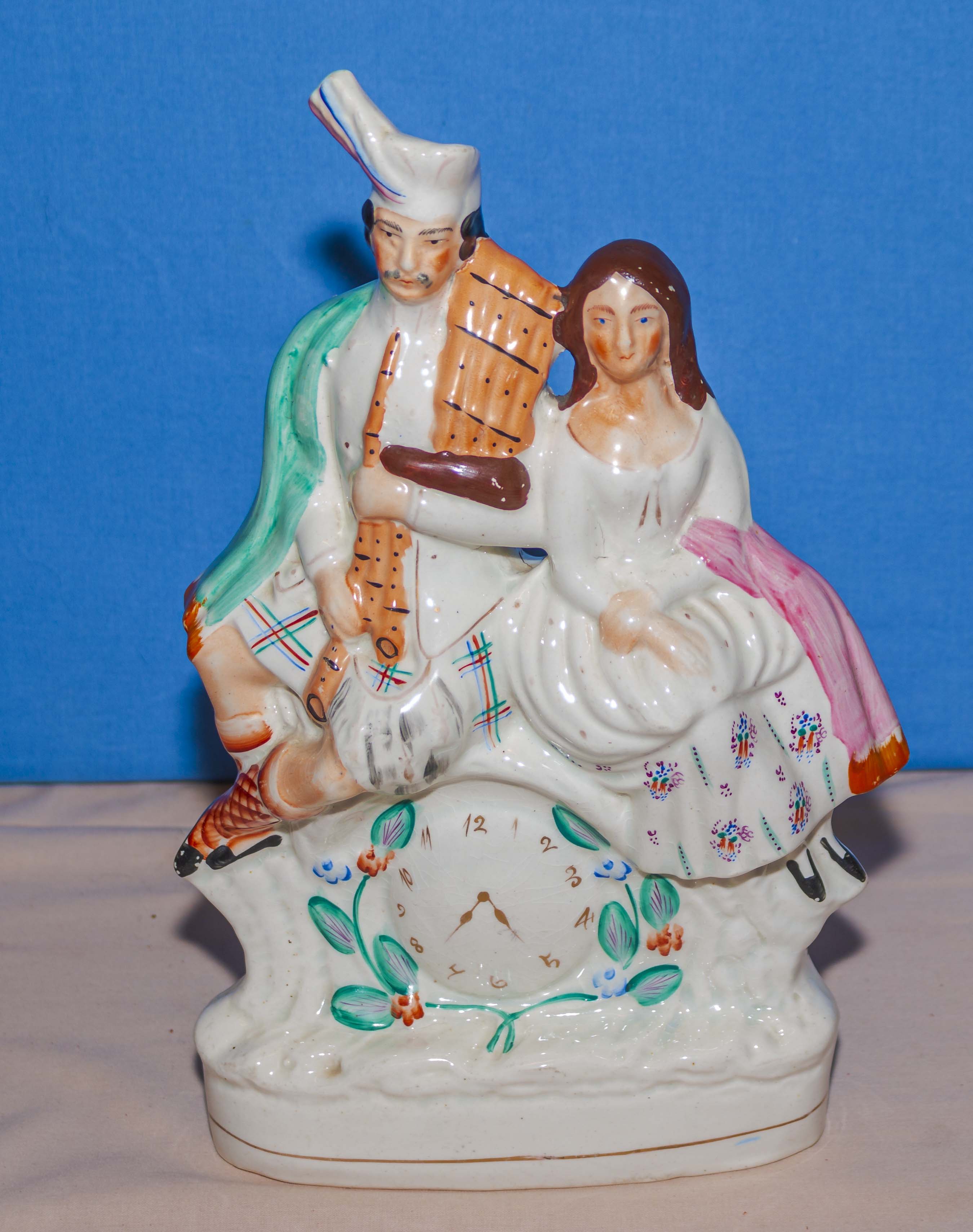 An original Staffordshire flat backed figure group