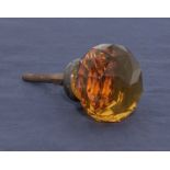 A Victorian centre amber glass door handle