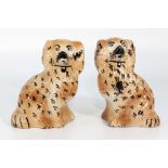 A pair of Victorian Staffordshire Wally dogs