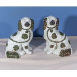 A pair of Victorian copper lustre Wally dogs