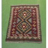 A Maimena Kilim, size 77cm x 56cm