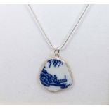 Mounted shard of Ming dynasty pottery pendant on sterling silver chain