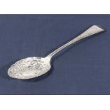 A silver dessert spoon. 60gms. Marks for Sheffield 1908