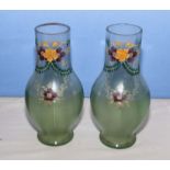 A pair of Victorian pale blue glass vases with painted decoration of flowers etc.