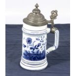 A German porcelain stein with lithophane in the base