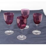 Four ruby wine glasses