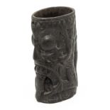 A black wood carved Maori Tiki pot