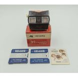 A vintage Viewmaster 3D viewer in original box with instructions and 10 reels