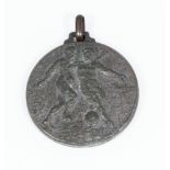 Football/military interest - a rare cast alloy football medal of historical interest. At the end