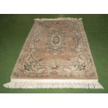 A Chinese style wool rug, 186cm x 123cm