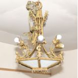A Circa 1900/20 gilt and ormolu ceiling light with opaque glass panels and seated cherubs around the