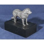 A silver plated study of a Newfoundland dog on a heavy slate base, the base measures 13cm x 7.5cm