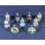 Nine 20th century Chinese decorated enamel snuff bottles