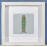 A framed mounted Egyptian glazed blue Faience Shabti, 25cm square