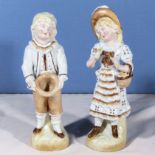 A pair of Continental porcelain figures, 22cm tall