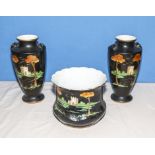 A Victorian jardiniere and two vases, black background with tree design