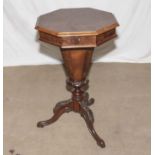 A Victorian hexagonal walnut sewing table, 44cm diameter and 72cm tall