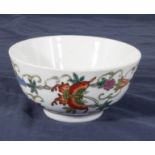 An antique Chinese famille rose bowl decorated with butterflies and flowers, 4.5" high