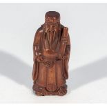 Hand carved hardwood Netsuke of an immortal (signed)