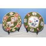 Two ironstone pottery plates, 26cm diameter