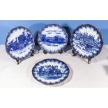 Four blue and white transfer printed plates, depicting Cathedrals and castles 24cm diameter