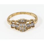 A ladys 18ct gold ring set with diamonds