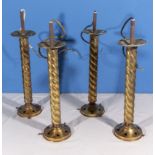 Four barley sugar twist brass light fittings, 37cm long