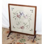 Fire screen with embroidered centre