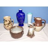 A collection of jugs and vases