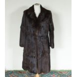 A lady's full length fur coat