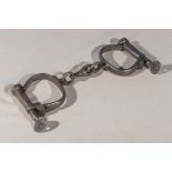 A pair of vintage military handcuffs stamped 1953 RCS, with keys
