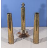 Three brass WW2 shells 1944, one converted into lamp base