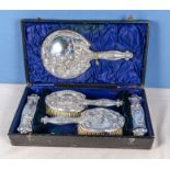 A fine quality silver boxed Art Nouveau lady's fitted vanity case, consisting of a large hand