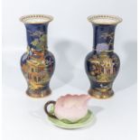 A pair of Carlton Ware vases and a cup and saucer, vases 21.5cm tall