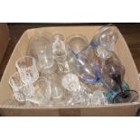 A box of assorted glasses