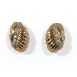 A pair of 14ct gold earrings set with 24 diamonds (.75 carats), 6.8gms