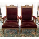A pair of Edwardian oak parlour chairs.