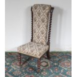 A rosewood prayer chair, 104cm tall