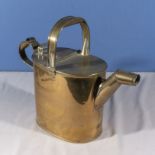 A brass watering can, 30cm tall