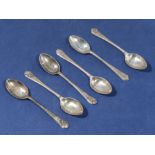 Golfing interest - set of six silver teaspoons with crossed golf clubs and ball finials, marked