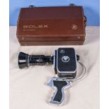 A vintage Bolex cine camera with fitted case